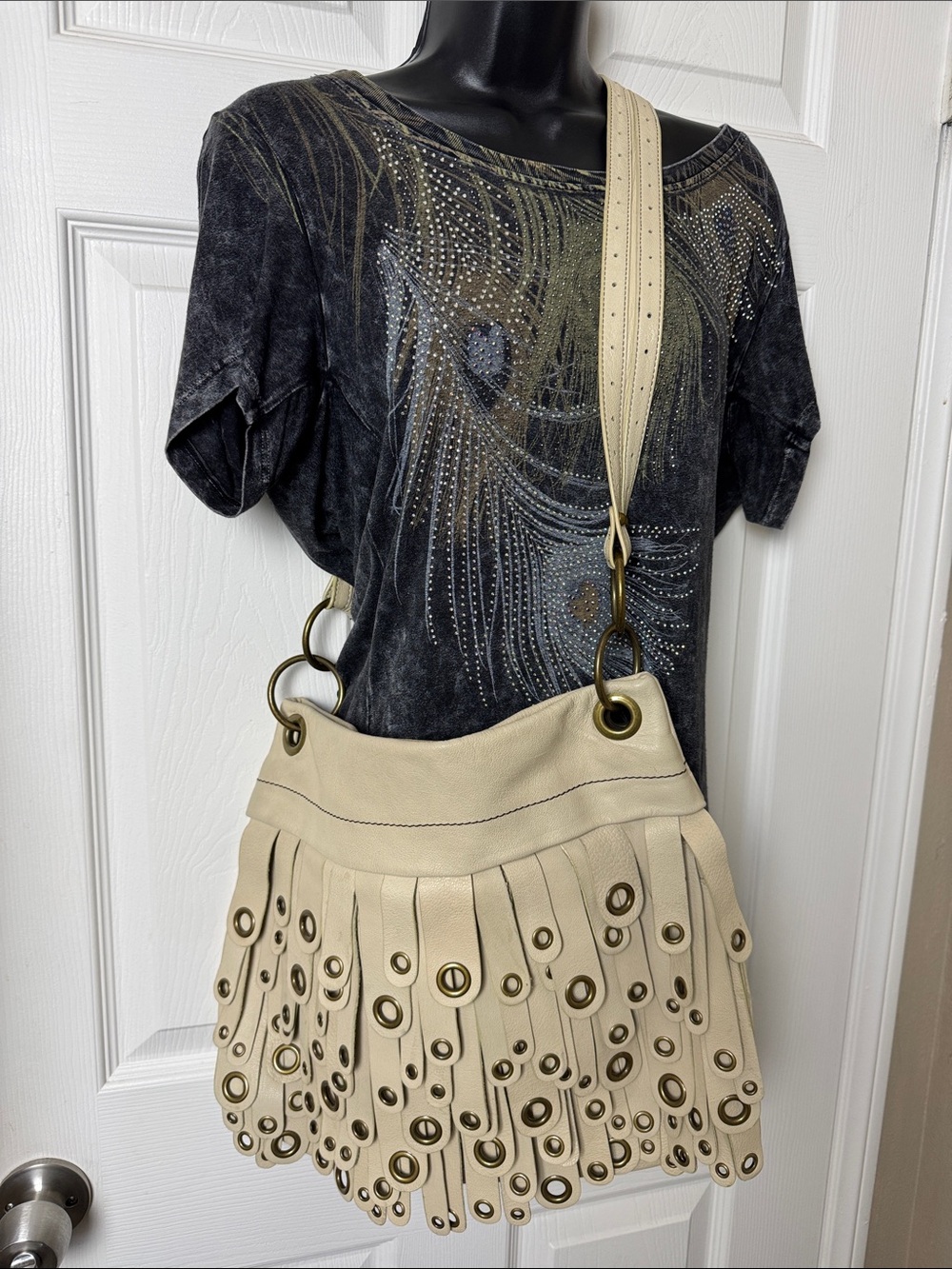 MAXX NEW YORK Bold Statement Bag with Leather Fringe and Grommets